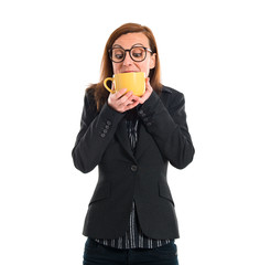 Woman holding a cup of coffee