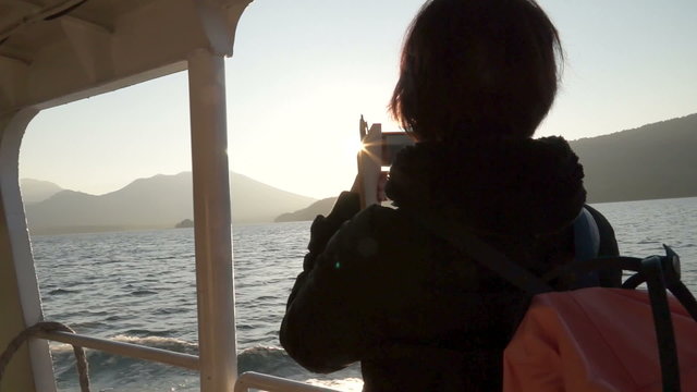 Photographer girl taking outside view handheld shot