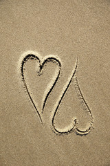 images of hearts in the sand