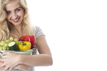 Young Woman Holding a Selection of Fruit and Vegetables