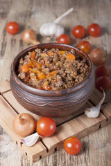 Minced meat stewed with cherry tomatoes, onion and garlic in a c