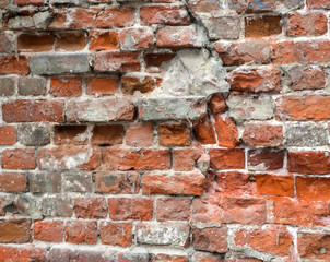 Old weathered brick wall fragment