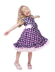 Beautiful little girl spinning around isolated