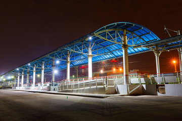 platform on the railway station at night