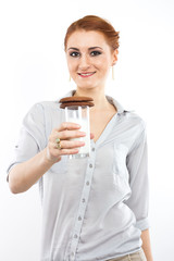 girl with a glass of milk and chocolate chip cookies