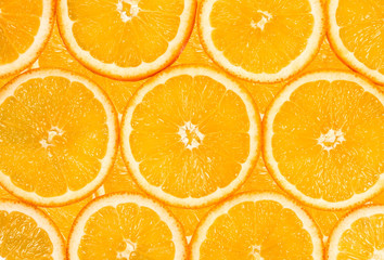 background of the many orange fruit slices