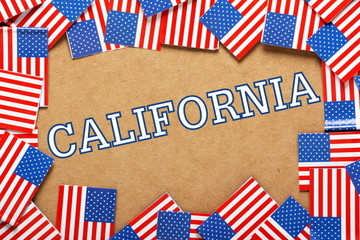 The name California with a border of USA Flags