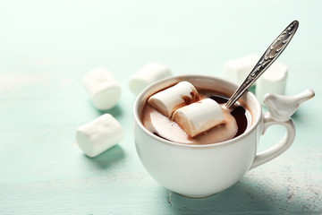 Hot chocolate with marshmallows in mug,