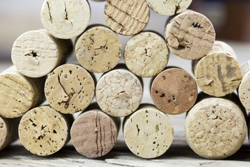 Close up of a wall of used cork wine
