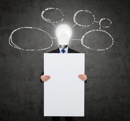 businessman with a lightbulb for a head