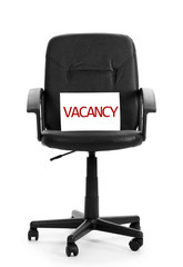Black office chair with vacancy sign isolated on white