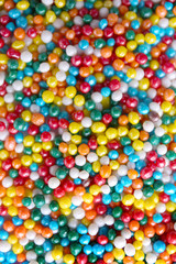 Colorful sugar sprinkles background