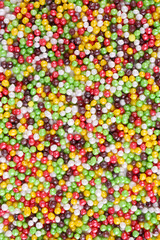 Colorful sugar sprinkles background