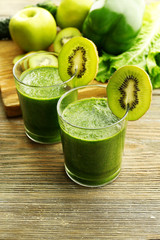 Green fresh healthy juice with fruits and vegetables