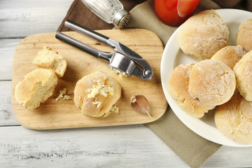 Fresh homemade bread buns from yeast dough with fresh garlic