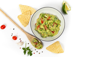 Guacamole on white background. Selective focus.