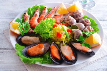 Seafood Paella on plate on table close-up