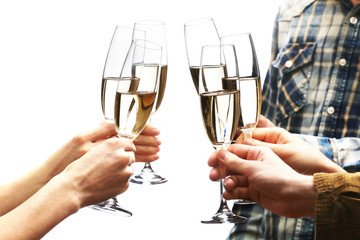 Clinking glasses of red wine in hands isolated on white