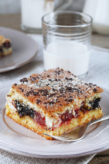 Homemade pies with jam and glass of milk