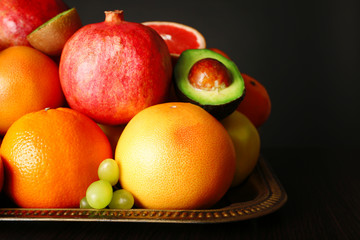 Assortment of fruits on table, close-up