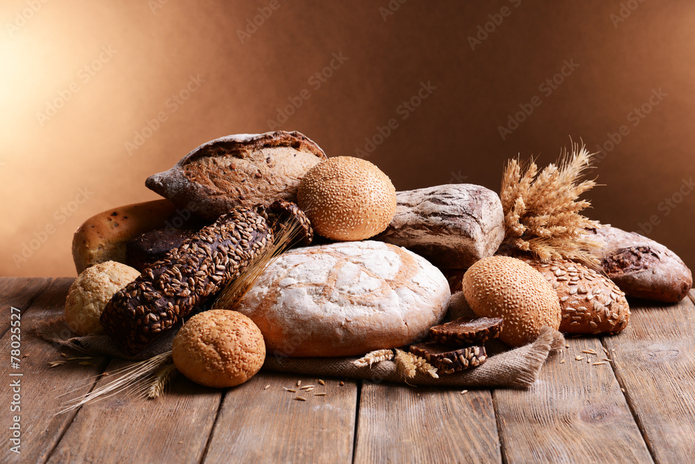 Canvas Prints different bread on table on brown background