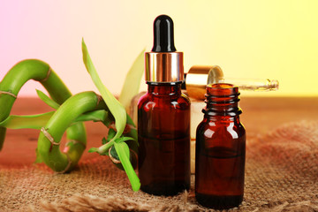 Bottles with aromatic oils and bamboo