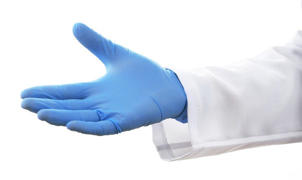 Doctor Hand In Sterile Gloves Isolated On White