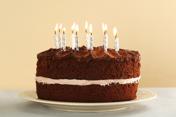 Delicious chocolate cake with candles