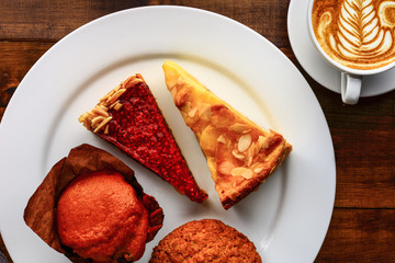 cup of cappuccino with dessert