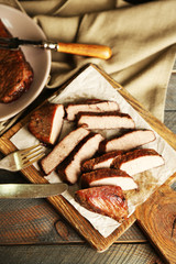 Composition with sliced roasted meat