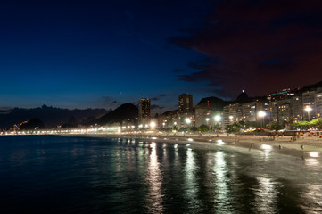 Fototapeta na wymiar Copacabana Beach at night in Rio de Janeiro, Brazil