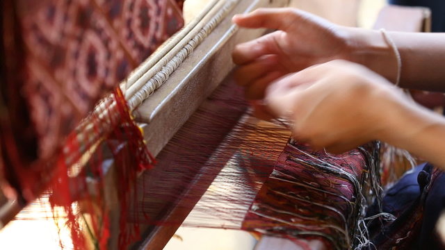 detail of traditional thai loom at work
