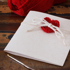 Handmade greetings card with crochet red heart for Saint Valenti