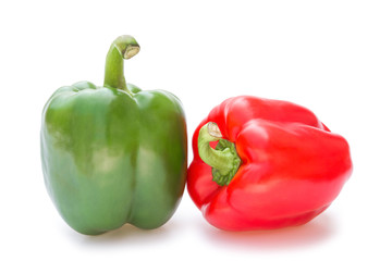 green and red bell peppers on a white background