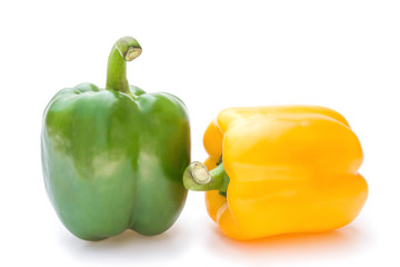 yellow and green bell peppers on a white background
