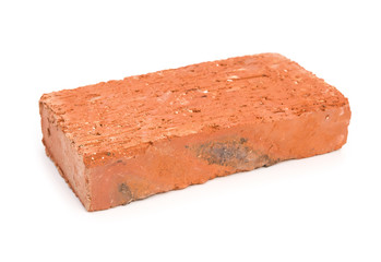 single brick on a white background