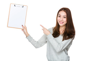 Woman finger point to clipboard