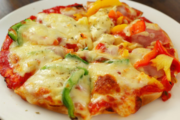Italian pizza ham cheese and pepper