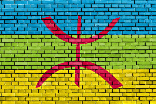 Berber flag painted on brick wall