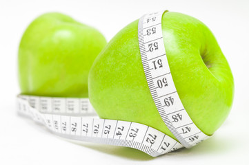 Green apple with measurementr