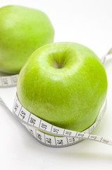 Green apple with measurement