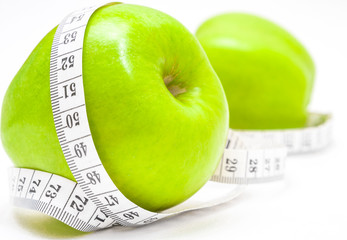 Green apples with measurementre