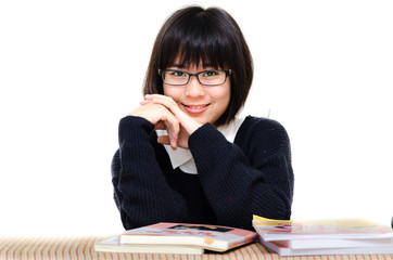 Asian teenager reading books.