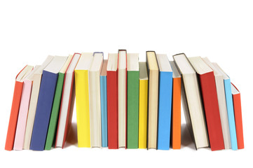 Small row line of colorful books library collection isolated white background photo