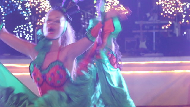 two girls in cabaret costumes dance cancan	