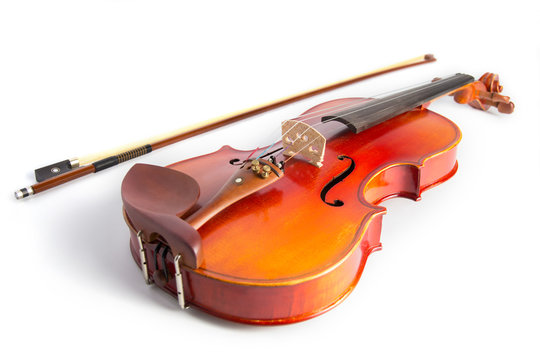 Violin and bow on white background
