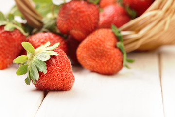 basket with strawberry on table