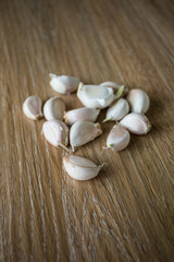 Fresh garlic on a wooden background
