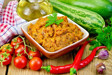 Caviar squash with tomatoes and peppers on board