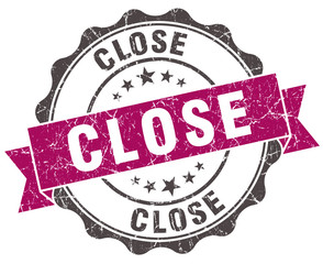 close grunge violet seal isolated on white